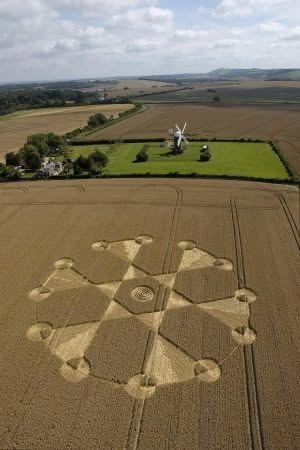 May be an image of the Atomium and windmill
